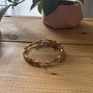 Alex & Ani gold and clear tan beaded bracelet